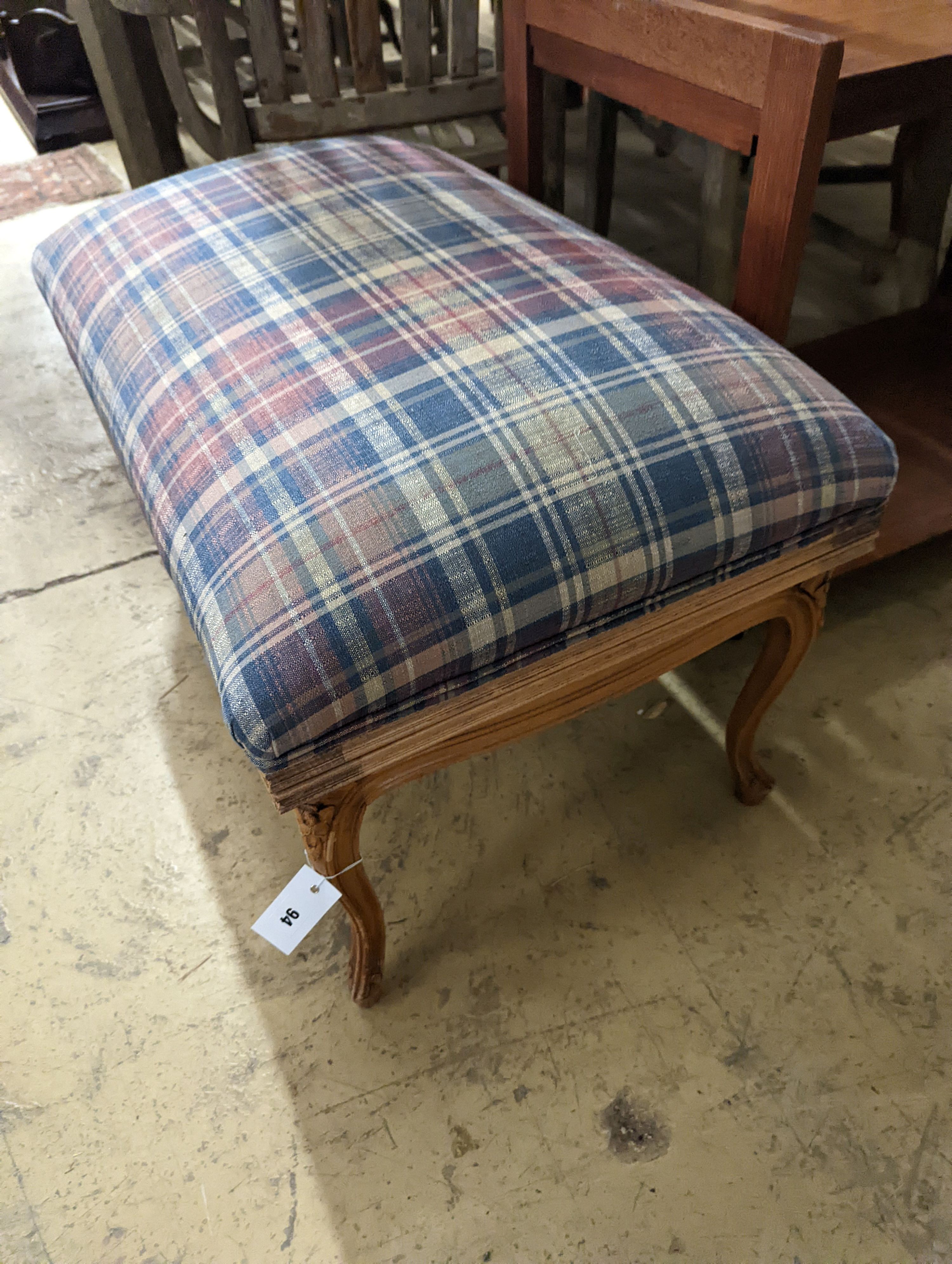 A pair of French carved beech upholstered stools combined luggage racks, width 80cm, depth 50cm, height 46cm